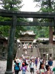 Entering under the great Torii Gate, Nikko Shrine