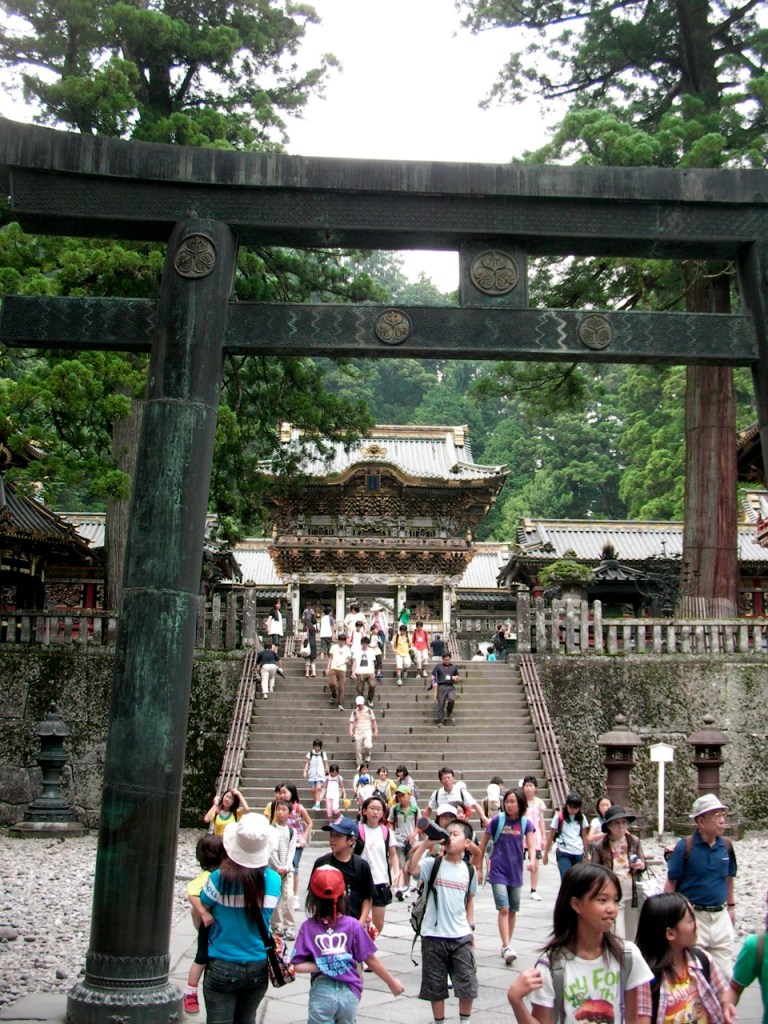 Entering under the great Torii Gate, Nikko Shrine