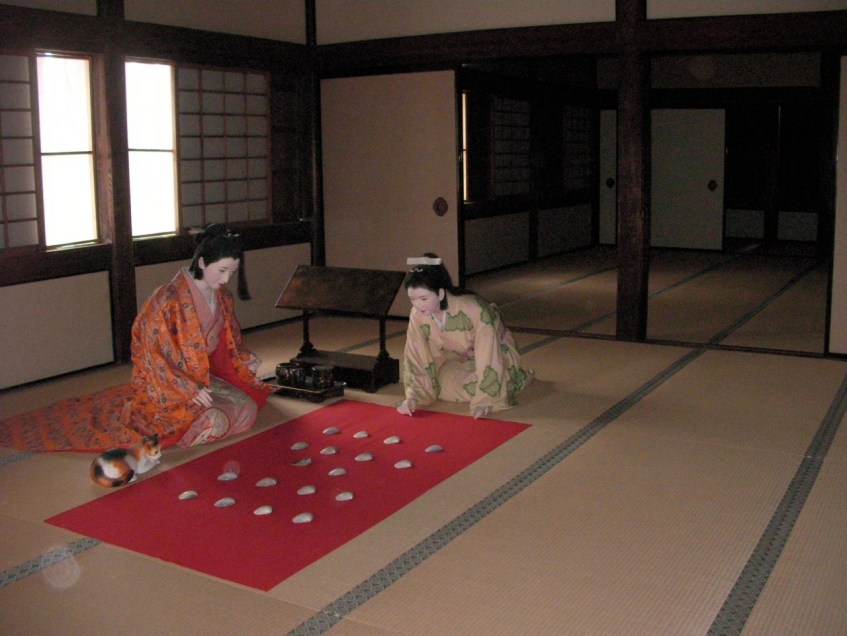 The Lady of the House Playing a Game